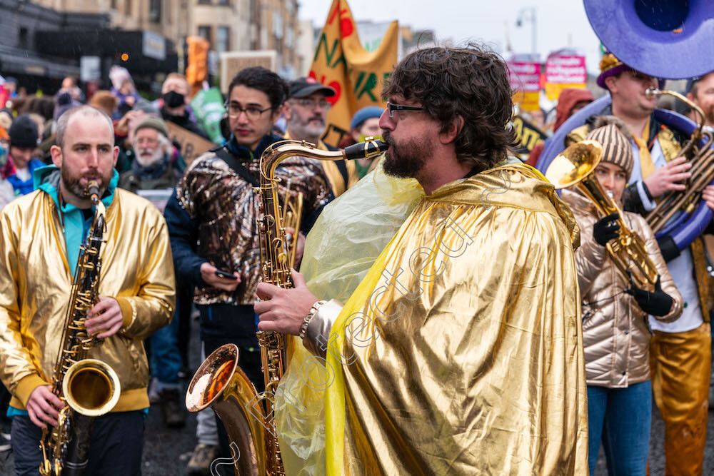 Cop26Glasgow 
 Protesters take to the streets in Glasgow for COP26, many groups representing, relgious, humanitarian, enviromental, political take part, over 100000 people attend the event. 
 Keywords: COP26, Glasgow, Clmate Crisis, XR, Extinction Rebellion, Deeds not Words, Feminism